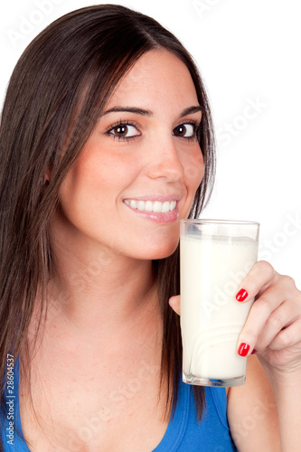 Photo: Beautiful girl drinking milk Beautiful girl drinking milk