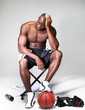 Young african american basketball player after a game defeat