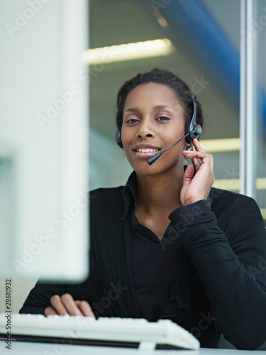 Photo: woman working in call center woman working in call center