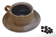 cup of coffee and coffe beans