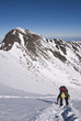 mountain climber on snow with beautiful winter scenery. mountain climber on snow with beautiful winter scenery.
