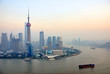 Shanghai the huangpu river and Pudong skyline at sunset.