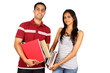 Two young Indian students isolated on white.