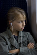 Photo: Young girl onboard a train Young girl onboard a train