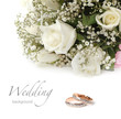 wedding rings and roses bouquet