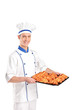 View of a baker holding croissants View of a baker holding croissants