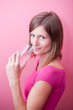 pretty, young woman drinking fresh water from a glass (color ton