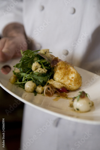 Photo: Breaded Goat Cheese on Warmed Frisee Salad Breaded Goat Cheese on Warmed Frisee Salad