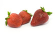 Three fresh strawberries isolated on white