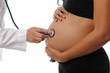 Photo: Pregnant woman being examine by a doctor Pregnant woman being examine by a doctor
