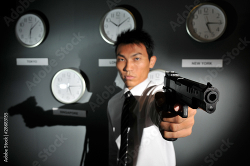 Photo: Asian Man with a Gun Asian Man with a Gun