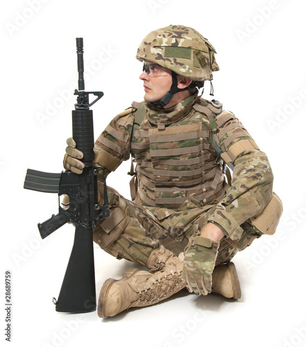 Photo: Modern soldier with rifle Modern soldier with rifle