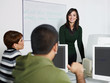 Photo: Teacher and students in college Teacher and students in college