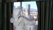 Video: Woman in bathrobe looks out Vegas hotel window - HD Woman in bathrobe looks out Vegas hotel window - HD