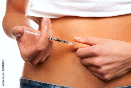 Photo: Subcutaneous abdomen insulin injection with syringe Subcutaneous abdomen insulin injection with syringe