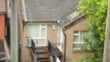 focusing from Irish house to spiderweb and out