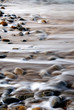abstract rocks and water on the shoreline abstract rocks and water on the shoreline