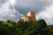 isolated tower in the forest under the lightning