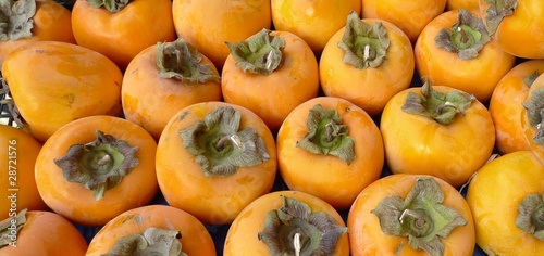 Photo: organic persimmons at the farmer's market organic persimmons at the farmer's market