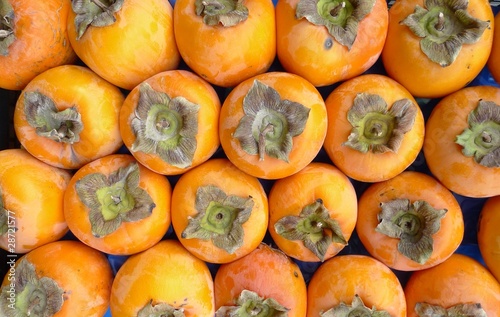 Photo: organic persimmons at the farmer's market organic persimmons at the farmer's market