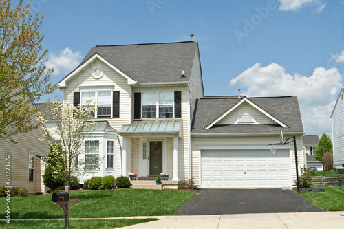 Photo: Front View Single Family Small House Suburban Maryland USA Front View Single Family Small House Suburban Maryland USA