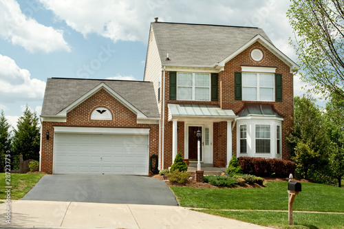 Photo: Front View Brick Single Family House Home Suburban Maryland, USA Front View Brick Single Family House Home Suburban Maryland, USA