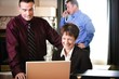 Business People Meeting With Computer