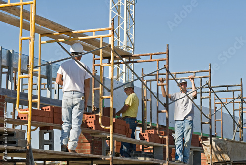 Photo: Workers on Scaffolding Workers on Scaffolding