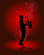Soilhouette sax player on red background Soilhouette sax player on red background