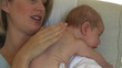 Video: Mother burping newborn baby after the feeding Mother burping newborn baby after the feeding
