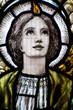 Detail of stained glass religious window in church