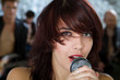 Beautiful rock singer with microphone