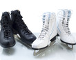 Two pairs of figure skates for ice skating