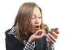 Photo: Young woman applying red lipstick Young woman applying red lipstick