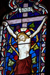 Detail of stained glass religious window in church