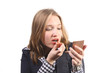 Applying lipstick