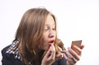 Photo: Applying make up Applying make up