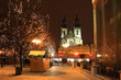 Gothic Tyn Cathedral on snowy Old Town Square, Prague