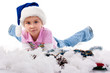 Beautiful girl in Santa's hat in tinsel and artificial snow Beautiful girl in Santa's hat in tinsel and artificial snow