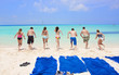 Photo: Young Adults running into the Beautiful Ocean Young Adults running into the Beautiful Ocean