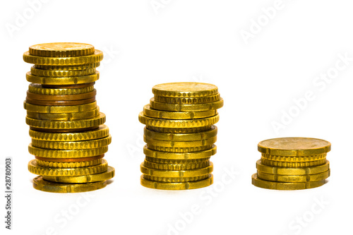 Photo: Piles of euro coins isolated on white Piles of euro coins isolated on white