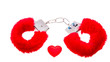 red soft sexual handcuffs with a heart isolated over white