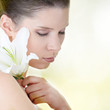 Portrait of Fresh and Beautiful woman with flower