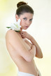 Portrait of Fresh and Beautiful woman with flower