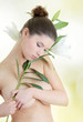 Portrait of Fresh and Beautiful woman with flower