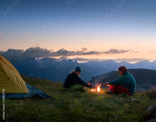 Photo: couple camping at night couple camping at night