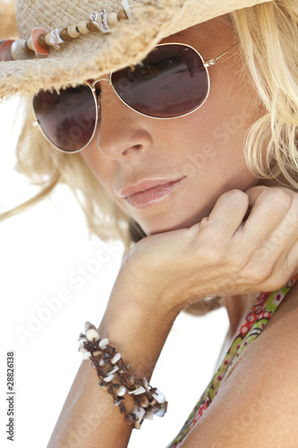 Photo: Sexy Blond Girl In Aviator Sunglasses and Straw Cowboy Hat Sexy Blond Girl In Aviator Sunglasses and Straw Cowboy Hat