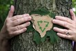 Photo: Environmentalist recycling tree hugger Environmentalist recycling tree hugger