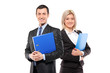 Team of happy businesspeople holding a fascicule