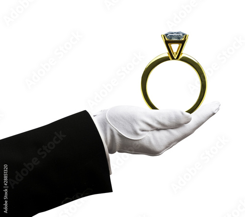 Photo: Holding diamond ring Holding diamond ring